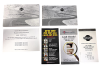 LOT Owner's Manuals OEM Cadillac CTS-V Chevy Suburban Cruze Toyota Nissan Mazda